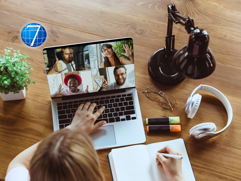 Remote meeting. Woman working from home, remote office concept. Young boss, manager in front of laptop during online conference with colleagues and teams.